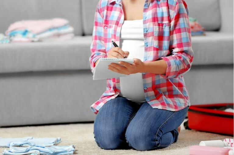 pregnant woman packing hospital bag