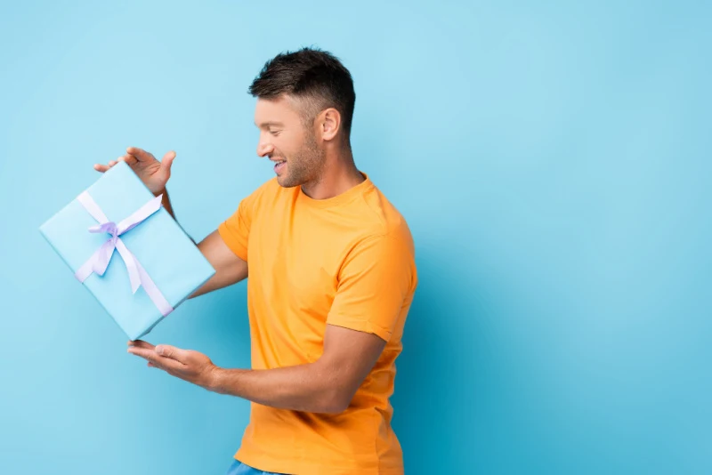 new dad holding Father's Day gift