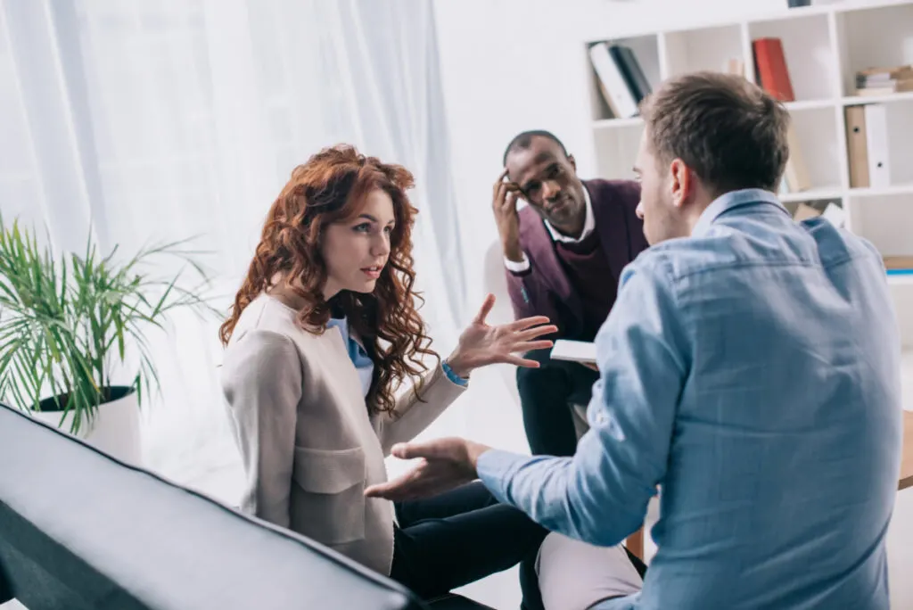 couple trying to work out their marriage issues with a counselor