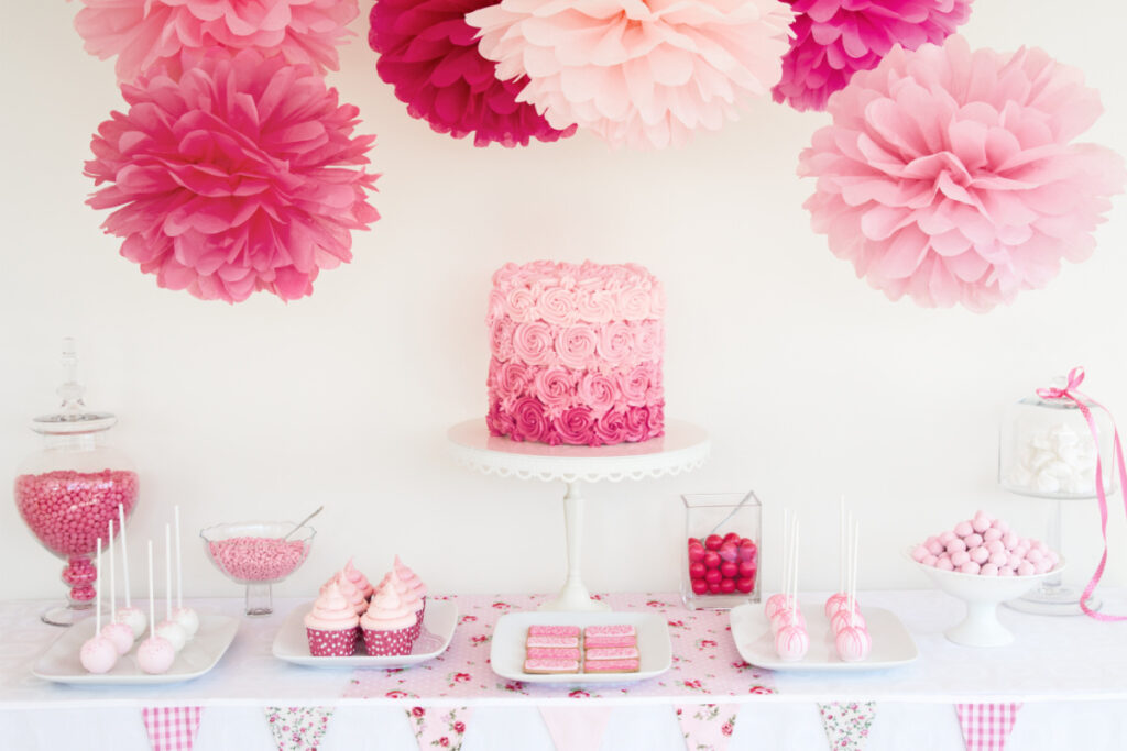 girl baby shower dessert table decorated in pink