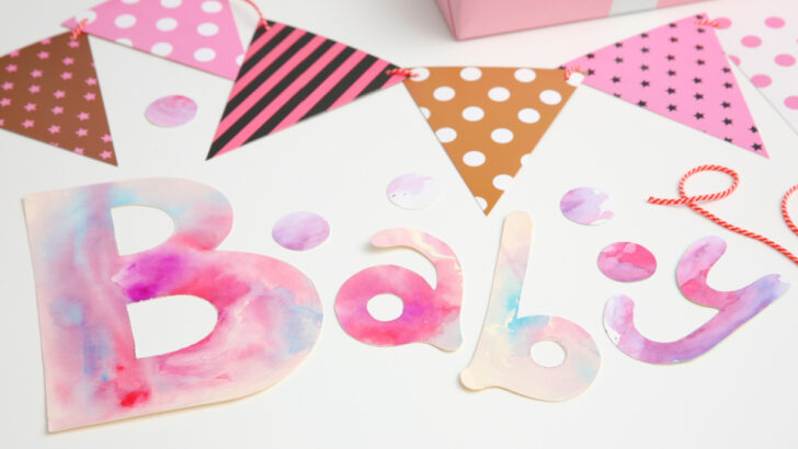 baby shower polka dotted banner with color word 