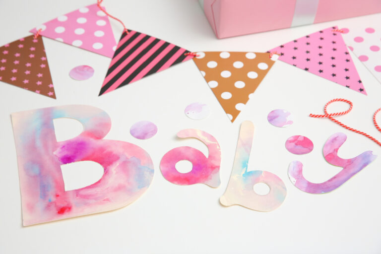 baby shower polka dotted banner with color word "Baby"