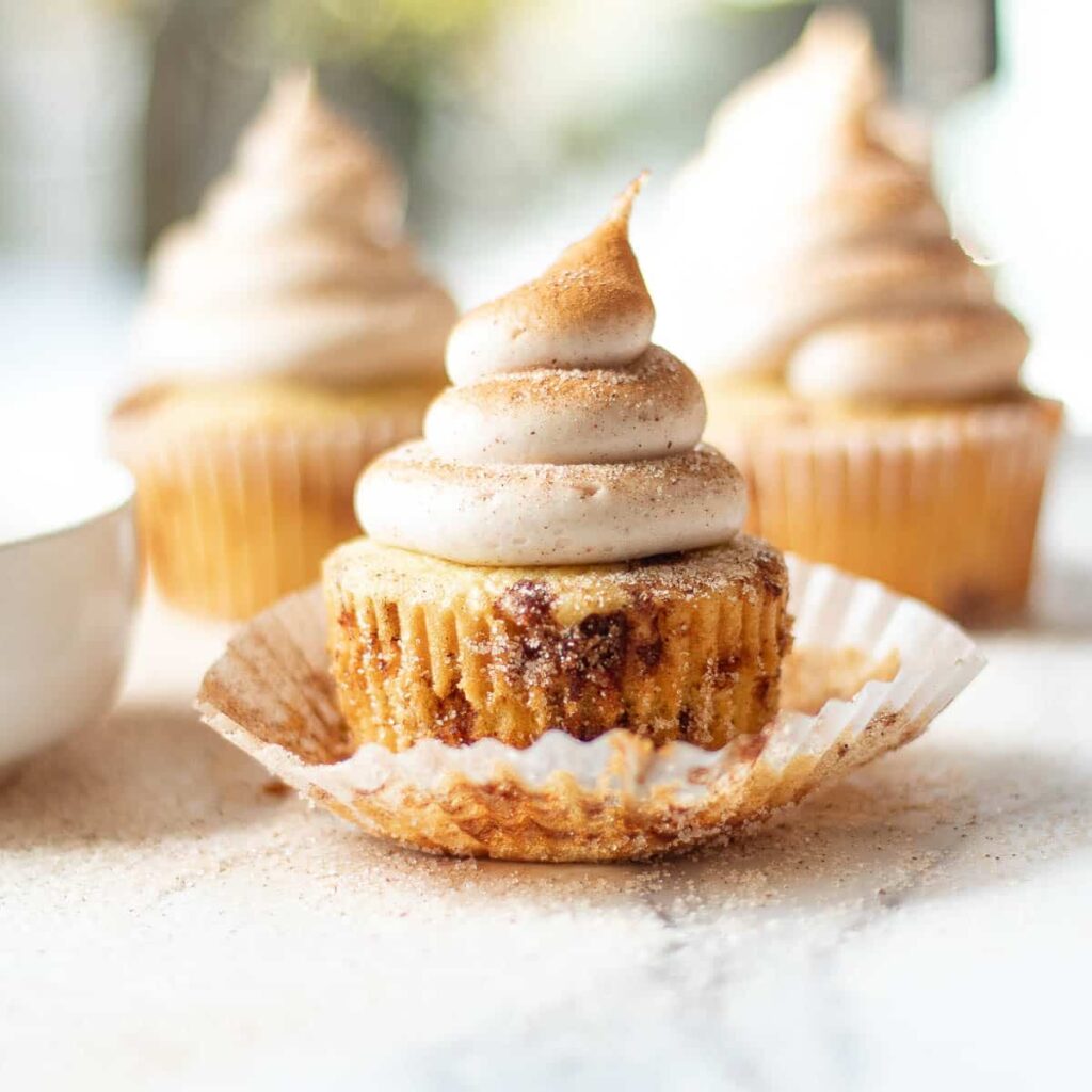 cinnamon cupcake with wrapper peeled off.