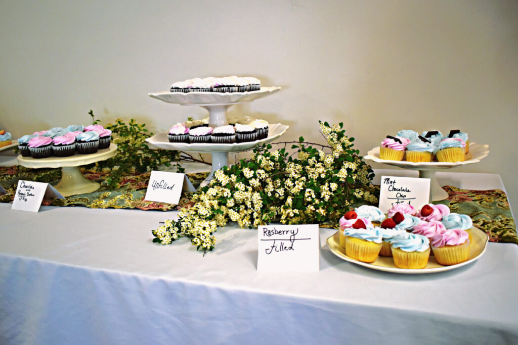 cupcake table at baby shower.