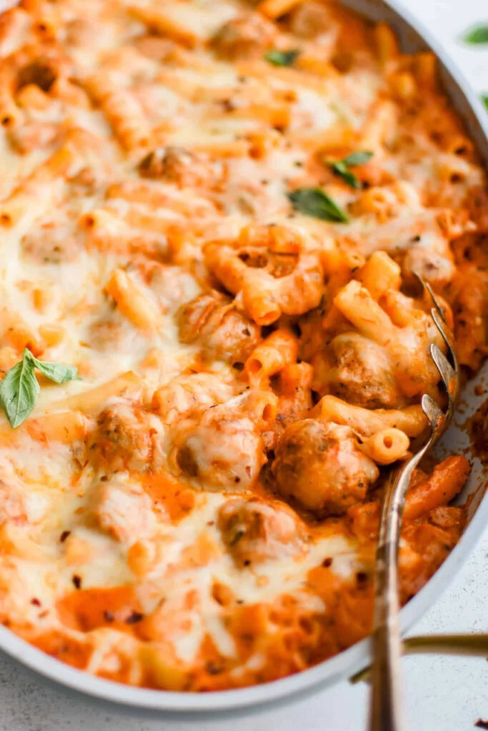 dump and bake meatball casserole in dish with serving spoon.