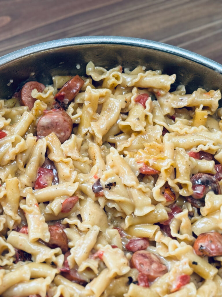 cheesy jalapeno sausage skillet in pan close up.